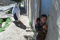 A woman in burka ventures out alone in a village in Northern Afghanistan (photo: Michael Lund)