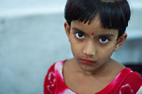 Five-year-old girl who has been raped in a slum outside Dhaka. Because of corruption and ineffectivity the culprit hasn't been punished (photo:  Michael Lund)